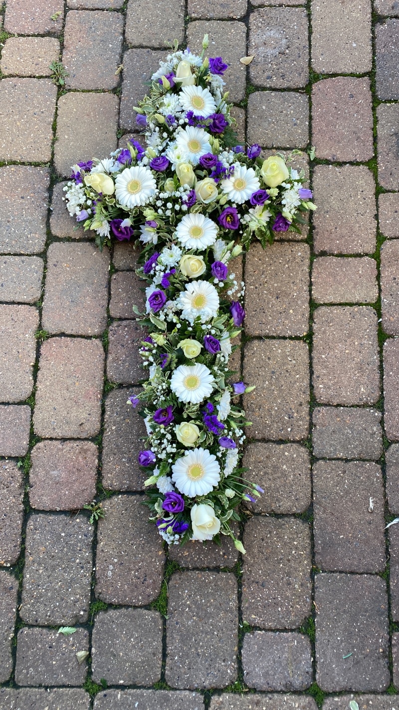 Cross funeral flower tribute