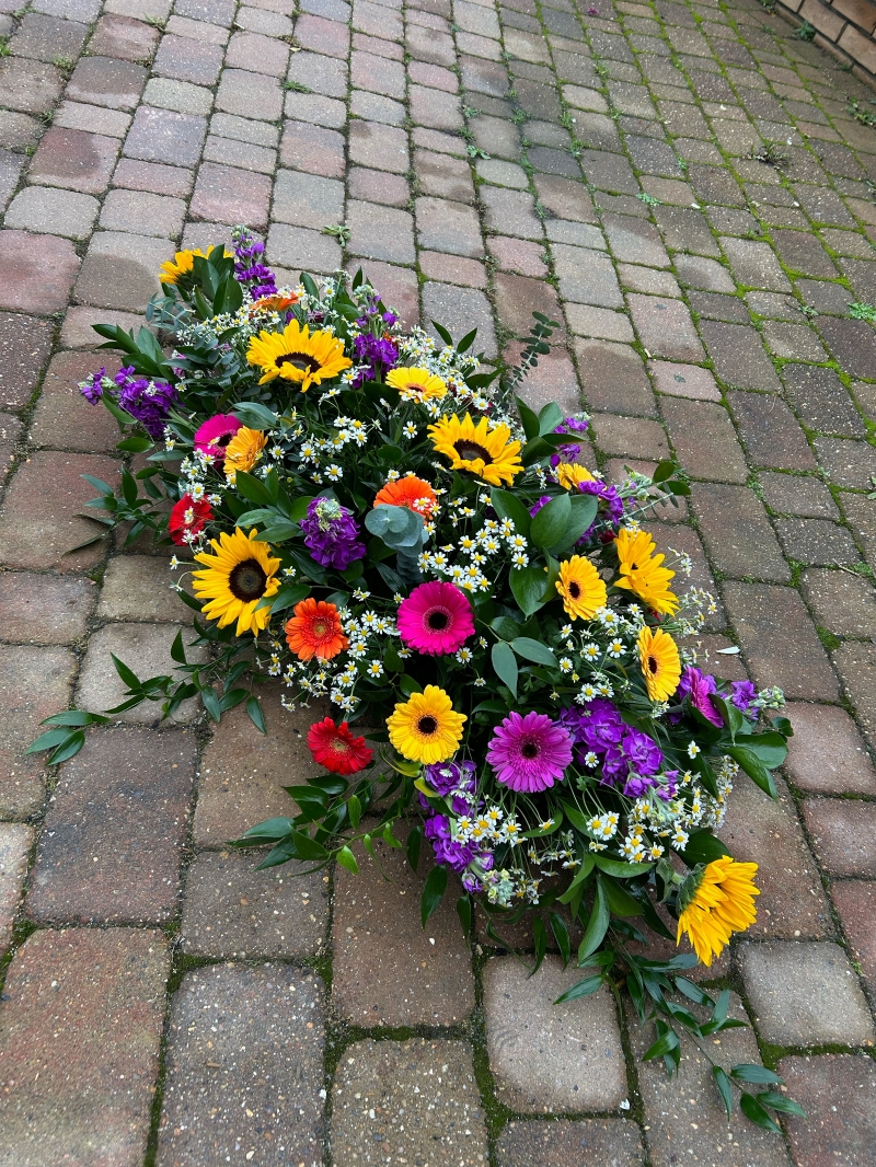 Bright Coloured Sunflower Coffin Spray