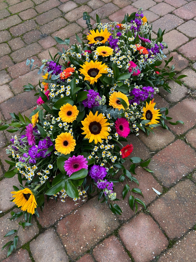 Bright Coloured Sunflower Coffin Spray