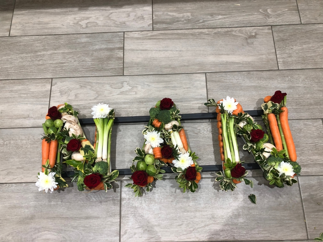 Vegetable letter funeral tribute