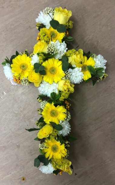 Cross funeral flower tribute