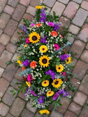 Bright Coloured Sunflower Coffin Spray